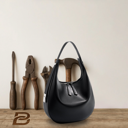 BERK | Crescent-shaped bucket bag made from genuine leather