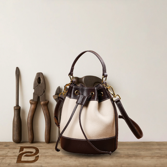 BERK | Two-coloured premium leather bucket bag with adjustable strap