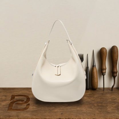 BERK | Crescent-shaped bucket bag made from genuine leather